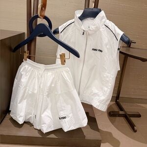 Miu Miu embroidered lettered tank top jacket + flowered skirt set